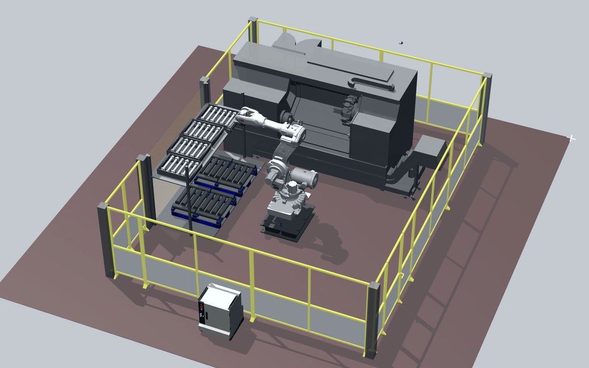 ABB robot loading a CNC lathe from bar pallets inside a fenced cell